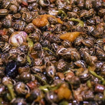 Cargols rostits amb salsitxes
